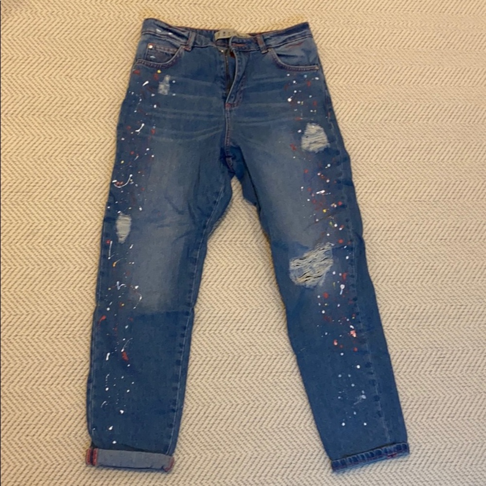 Paint splatter and ripped boyfriend jeans